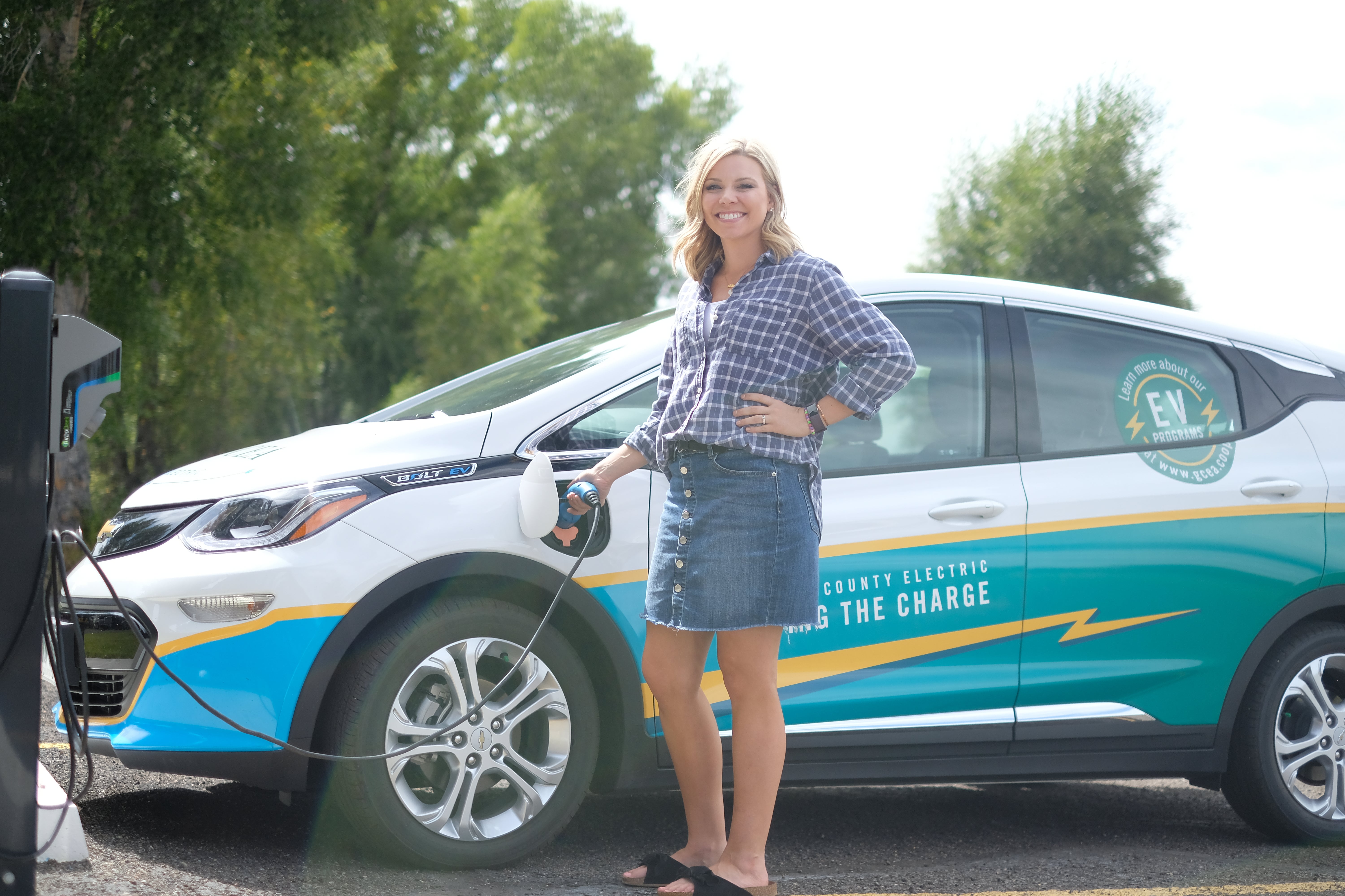 Woman Charging EV